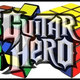 Uber-Geek Solves Two Rubik's Cubes While Playing Guitar Hero On Expert